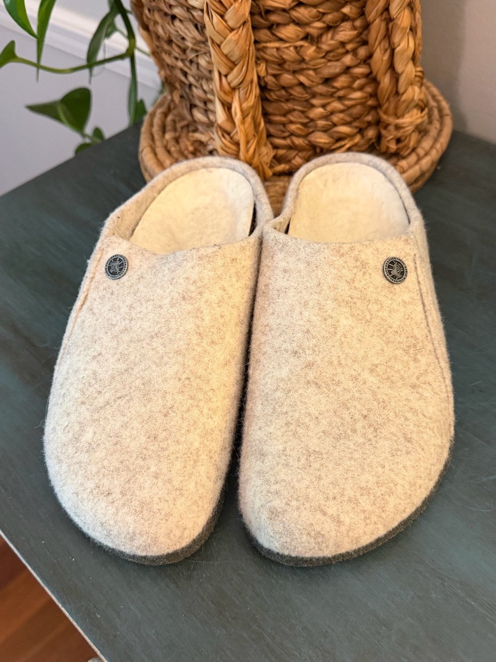 Birkenstock Zermatt slippers feature a cozy eggnog-colored wool felt